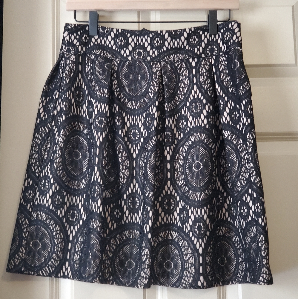 Beige skirt with black lace overlay